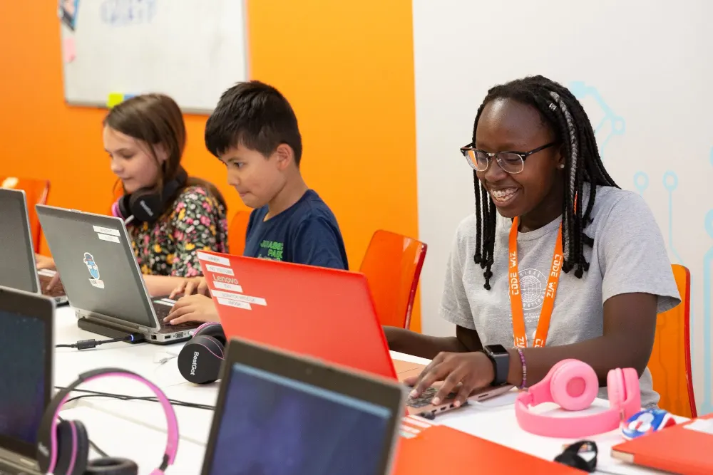 Students building projects in class at Code Wiz Edison